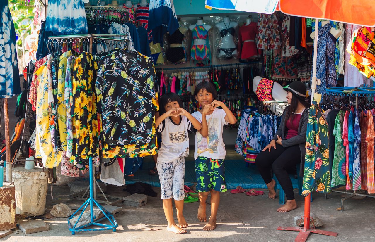 1280 Herzlich Koh Sichang Two funny little asian girls holding hands in a shape of heart shutterstock 1659155473