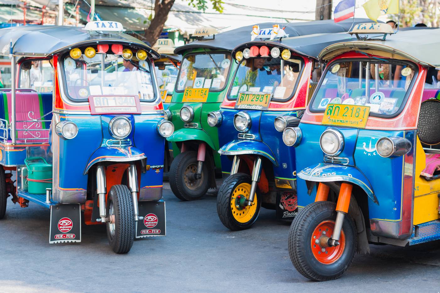 1400 Thai Tuk Tuk taxi on Maharaj Road Rattanakosin Island of Bangkok shutterstock 390665228