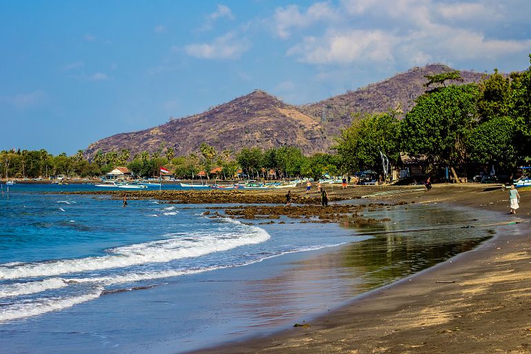 6 01 770 Bali Beautiful beach with dark sand shutterstock 1453257324