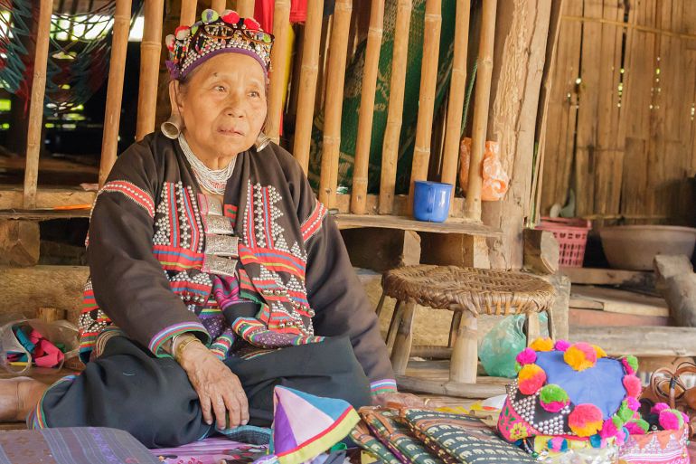 770 Sensationell Nord traditional of thai old woman selling souvenirs at Chiangmai shutterstock 531098482