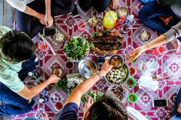 1280 happy friends at picnic on countryside shutterstock 784448458